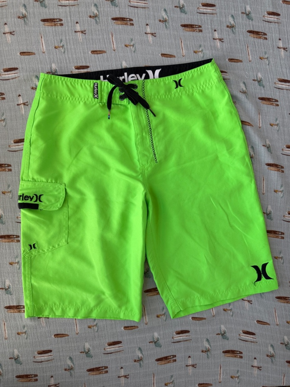 Bright green Hurley board shorts size 28”